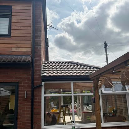 Tiled conservatory roof finished with new roofline